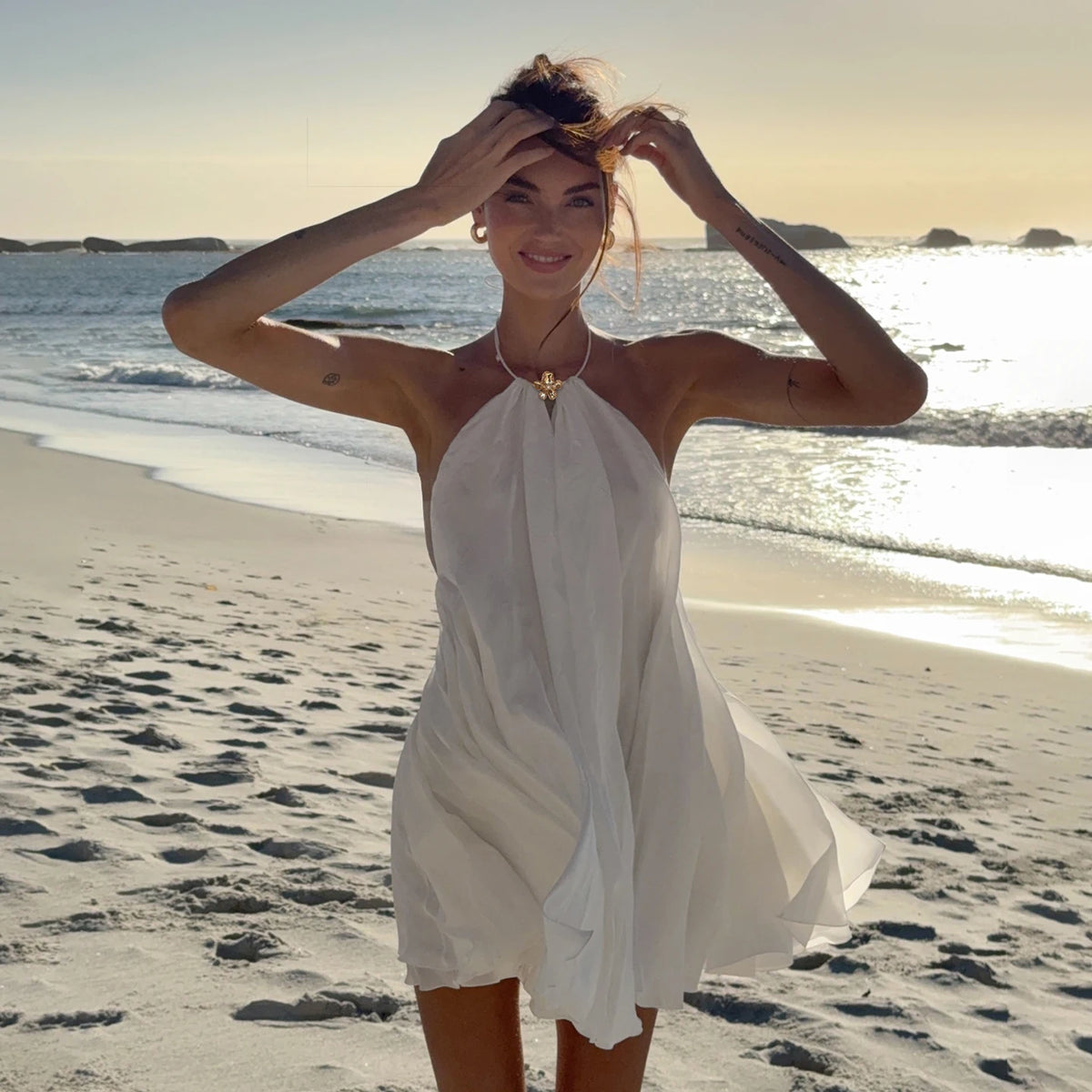 Backless white dress detail