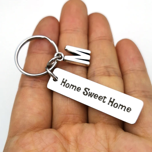 Stainless steel housewarming keyring