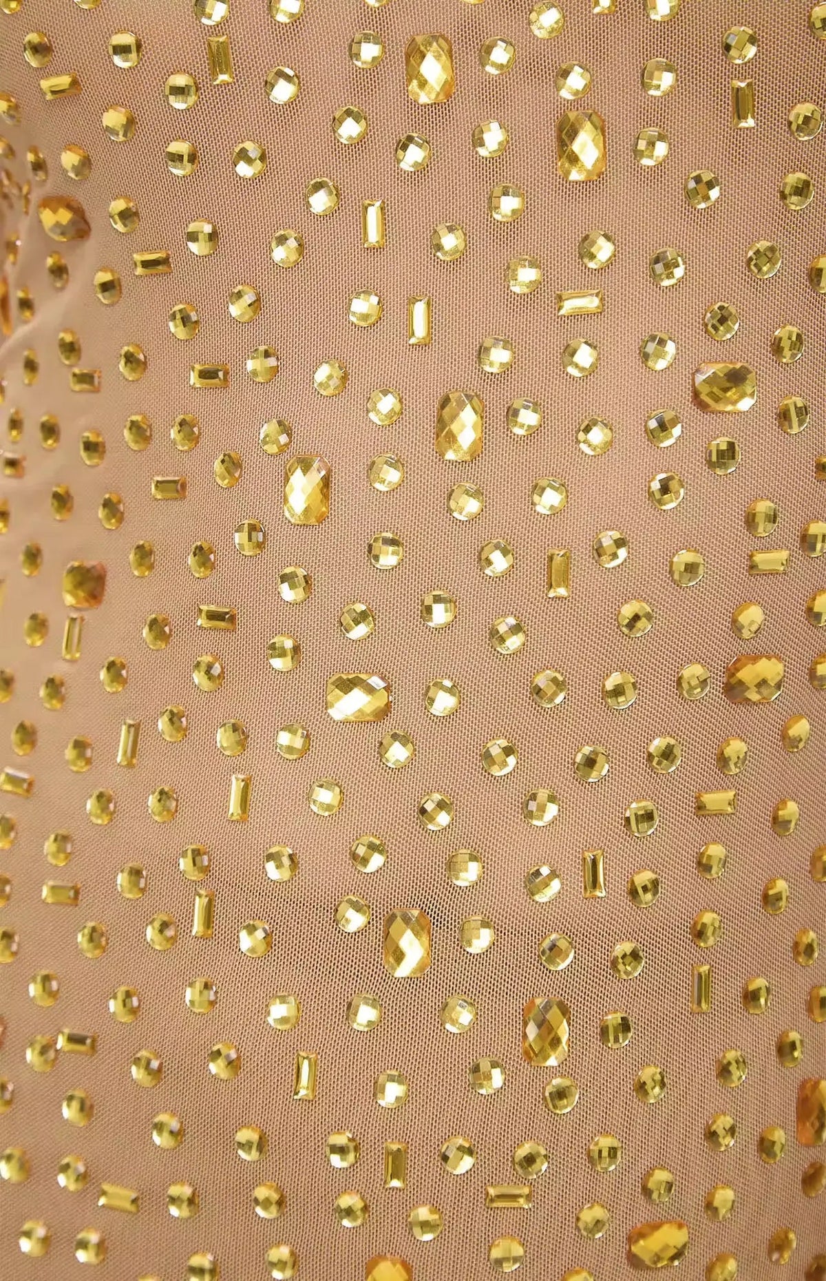 Beige fabric with gold metallic dots