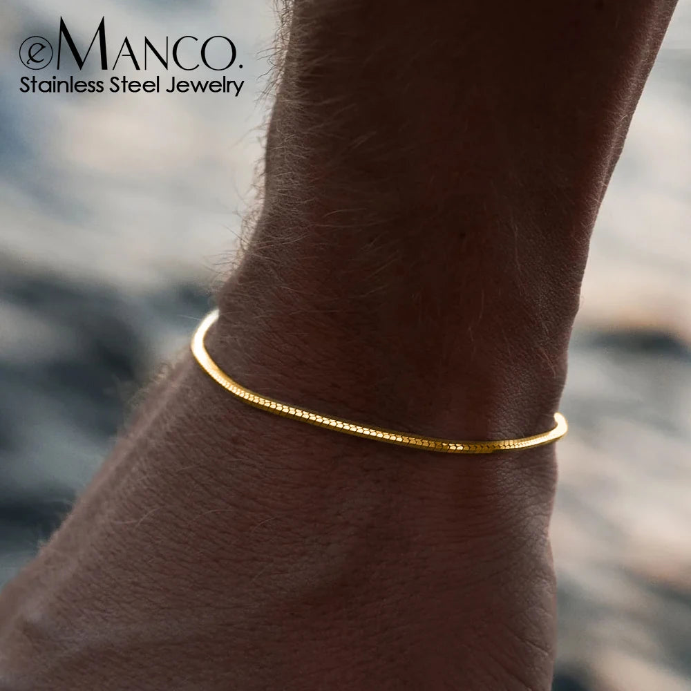 Minimalist gold chain bracelet on wrist