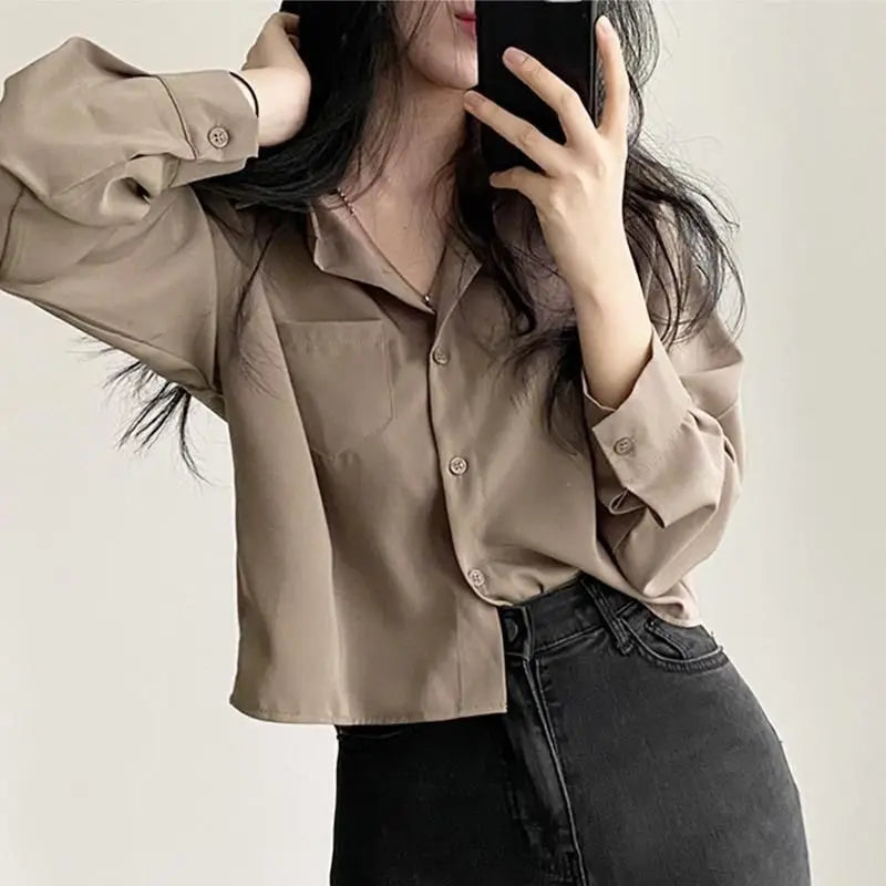 Women's relaxed long sleeve button-up shirt